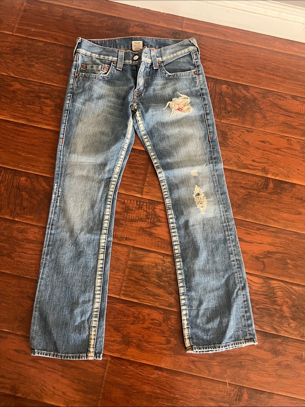 True Religion bobby Faded Blue Jeans with Distressed Accents